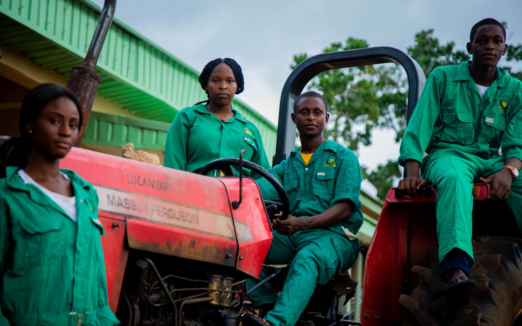 NuChem Ghana local farm team and tractor